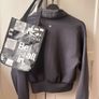 Stunning Lululemon Full Flourish black sweater. Image 3