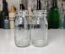 335 - Set of 2 Vintage Clear Glass Collectible Decorative Jars