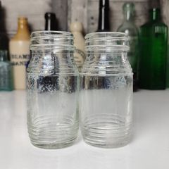 335 - Set of 2 Vintage Clear Glass Collectible Decorative Jars