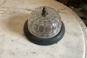 Old brass mounted glass ceiling light in a low profile