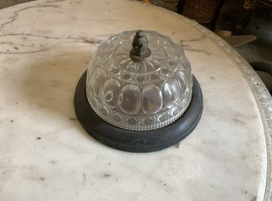 Old brass mounted glass ceiling light in a low profile