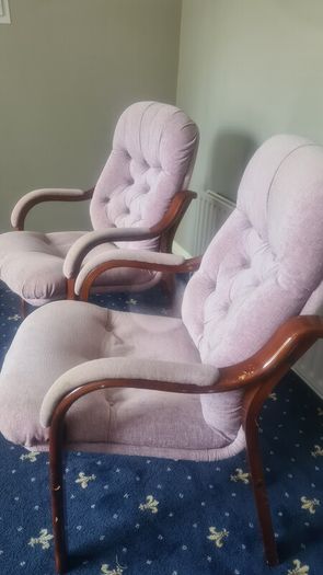 Two High Backed fireside Chairs