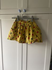 Mustard polka dot skirt with pockets  age 4-6