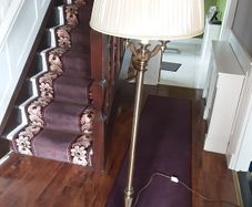 Standard lamp with cream pleated shade