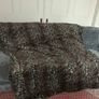 Large leopard skin fur throw and cushions Image 4