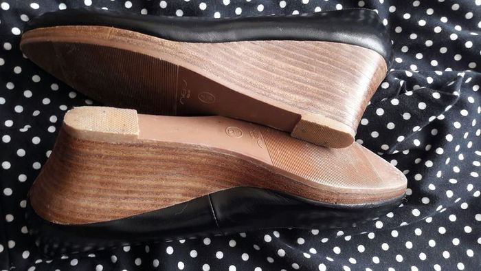 Black shoes with brown wedge heel