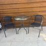 Small glass top garden table and x2 metal frame chairs Image 3
