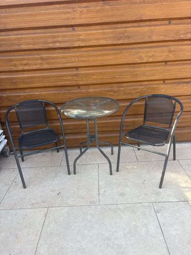 Small glass top garden table and x2 metal frame chairs