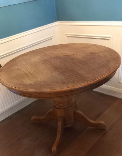 Round solid wood table