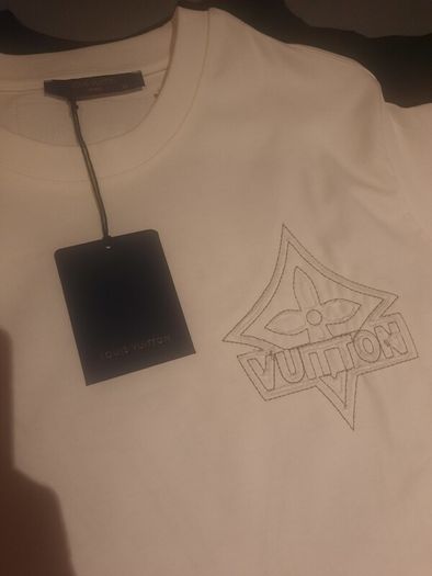L V  brand new Tshirt