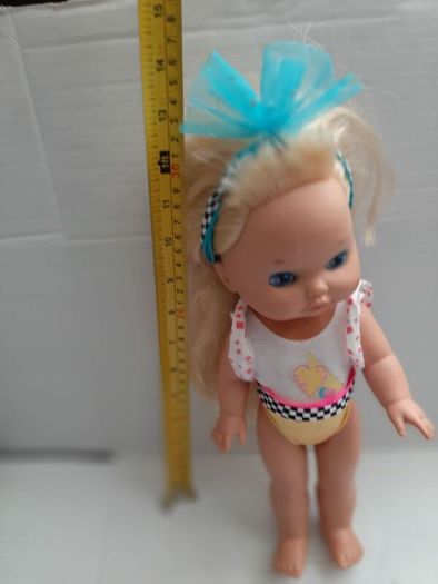 collectable vintage matel doll in original clothes