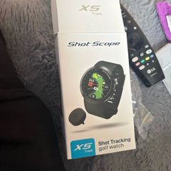 Golf watch with tags and spare tags