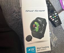 Golf watch with tags and spare tags