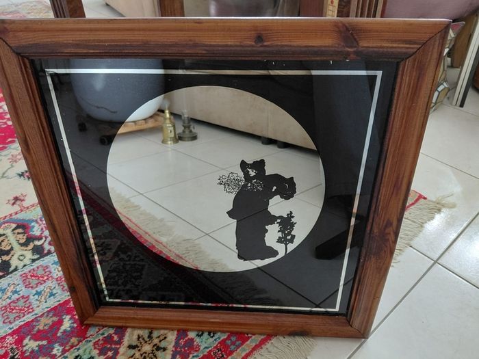 Vintage silhouette mirror lady image in black in wooden frame