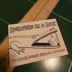 Bunnies in a Box dark humour postcards