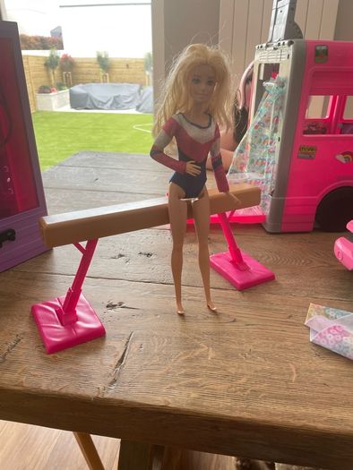 Barbie campervan, wardrobe and gymnastics bar, lots of spare of accessories also included (no photo)