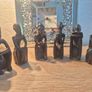 Set of 6 Vintage African Hand-Carved "Thinker" Figurines An excellent matching collection of vintage African "Thinking Man" sculptures. Each individual piece is uniquely hand-carved out of a single block of dark hardwood with a lovely smooth, polished fin Image 4