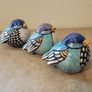Mid-century trio of handpainted ceramic birds Image 4