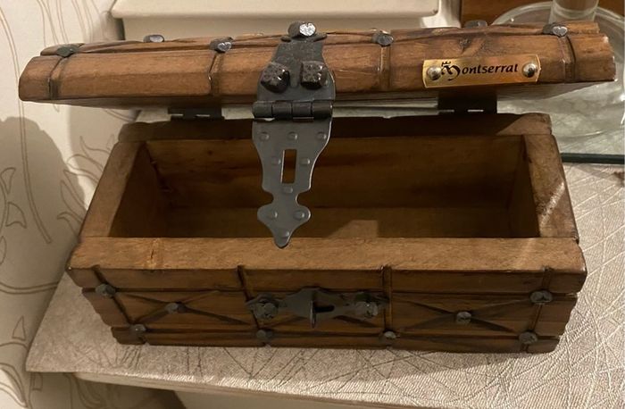 Antique  a wooden money  chest , having brass escutcheon and black metal hinges. 20cm x10