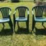 Green plastic garden chairs Image 2