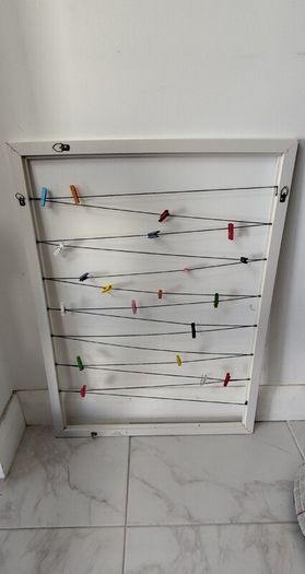 Wall Photo Display with Pegs and Strings