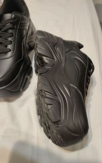 High black trainers.