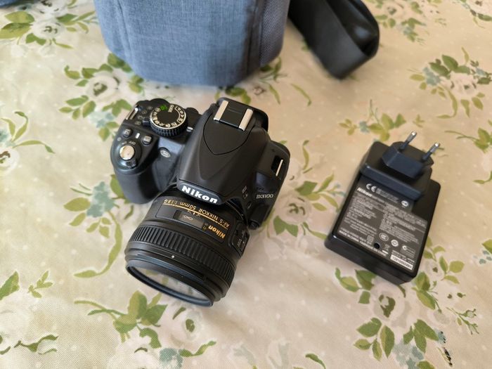 Nikon D3100 + Nikon 50mm f/1.8G AF-S Nikkor
