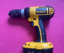 DeWalt 18 V combi drill including two batteries, charger and case. The batteries are not DeWalt but our NEW (less than a year-old).