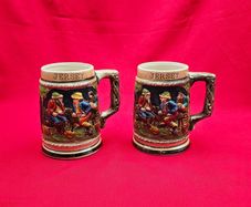 Two German-style ceramic mugs with the words JERSEY on them