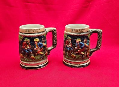 Two German-style ceramic mugs with the words JERSEY on them
