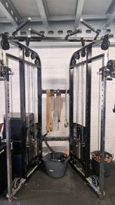 Dual arm cable machine