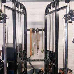 Dual arm cable machine