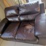 2 x two seater brown faux leather couches Image 9