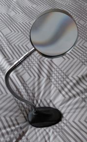Vintage magnifying glass on stand