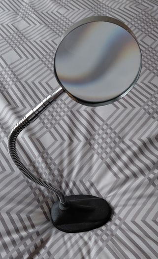 Vintage magnifying glass on stand