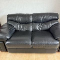 black two seater sofa