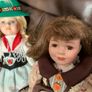 5 porcelain dolls with extra clothing perfect condition Image 9