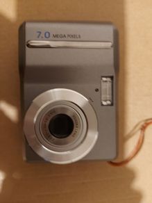 PENTAX 7 Megapixels Digital Camera, takes 2 AA Batterys, works fine, in very good cosmetic condition