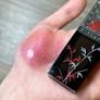 Girlcult C-Beauty The Classic of Bizzare Tales Lip Glaze in J80 Pink Apricot Chameleon Image 4