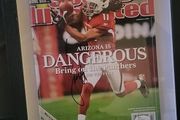 Framed Larry Fitzgerald autographed sports illustrated magazine with Cos