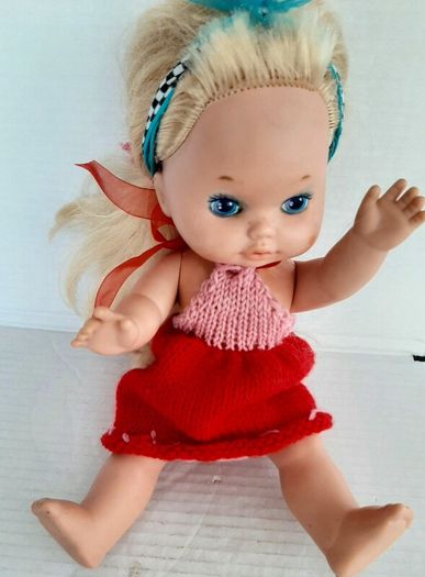 collectable vintage matel doll in original clothes