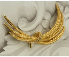 Monet Vintage Brooch Textured Gold Tone Elegant Design Signed