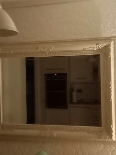 cream antique style mirror