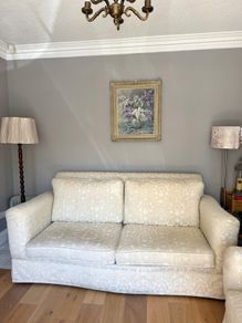 Cream and white floral large sofa / couch