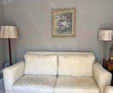 Cream and white floral large sofa / couch