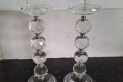 A pair of crystal glass pillar candleholders