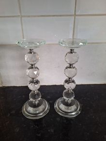A pair of crystal glass pillar candleholders