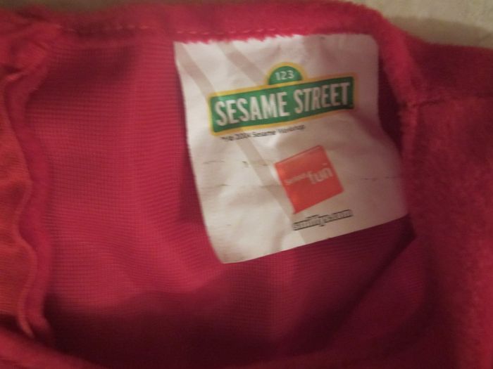 Large red costume..sesame street....