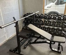 Weight rack with Barbell and Bench
