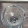 Tall heavy clear glass spirit decanter with large solid glass stopper. Image 3